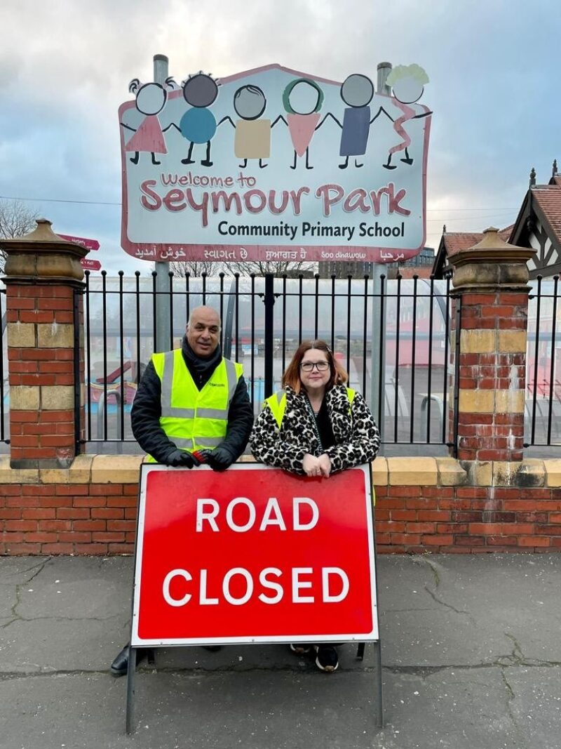 Cllrs Waseem Hassan and Emma Hirst volunteering during at Seymour Park Schools Streets project. 
