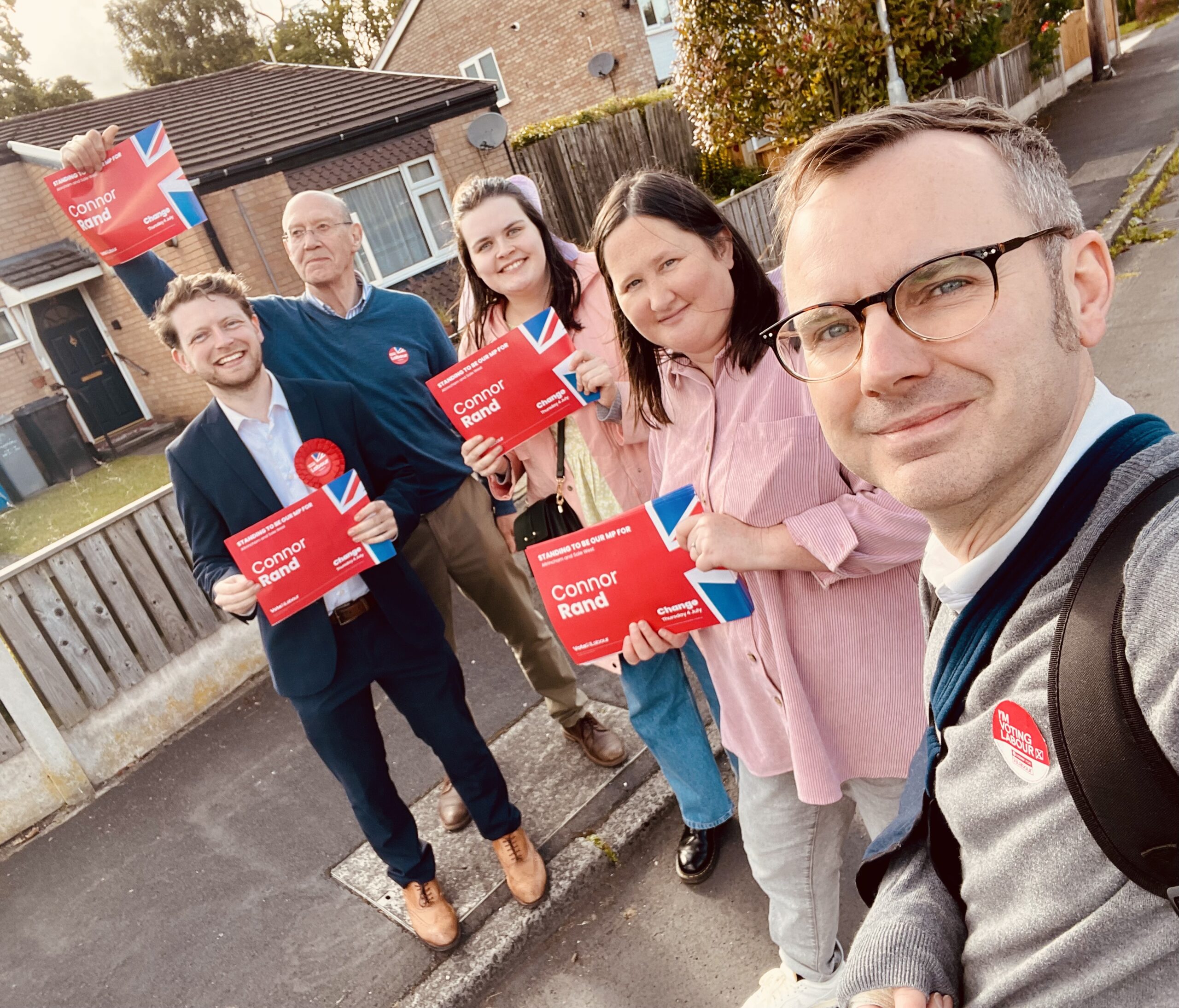 Tom out on the doorstep with Connor Rand